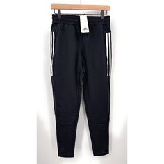 Brand: Adidas Color: Black Pattern: Solid Size/Waist: S Inseam: 29in Rise: 13in Adidas Sportswear Jogging Bottoms, Adidas Sportswear Bottoms For Jogging, Adidas Sporty Relaxed Fit Pants, Sportswear Bottoms With Three Stripes Branding For Jogging, Sporty Adidas Sweatpants With Elastic Waistband, Adidas Relaxed Fit Bottoms For Jogging, Relaxed Fit Sports Bottoms With Three Stripes, Adidas Streetwear Bottoms For Sports Season, Adidas Relaxed Fit Moisture-wicking Bottoms