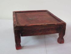 an old wooden table with legs on white background