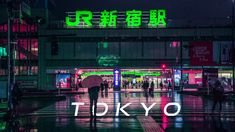 people walking in the rain with umbrellas and neon signs above them that read tokyo