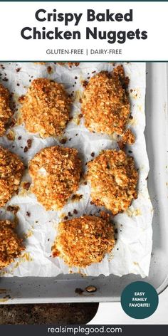 crispy baked chicken nuggets in a baking pan with the title overlay