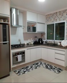 the kitchen is clean and ready for us to use in its new owner's home