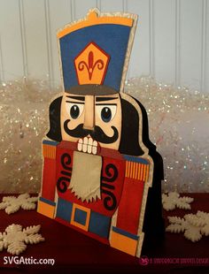 a cardboard nutcracker is sitting on a table