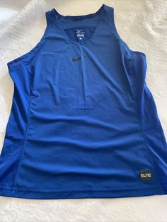 Women’s large Nike Elite dri fit blue basketball tank. Condition is "Pre-owned". Shipped with USPS First Class. Style: 807166-480. Armpit to armpit is 20 inches. Armpit to bottom is a little over 16 inches. In really good condition. Sleeveless Basketball Top In Athleisure Style, Nike Sleeveless Tops For Sports Events, Nike Sleeveless Tank Top For Gym, Nike Blue Activewear For Gym, Nike Sleeveless Sportswear Tank Top, Nike Sleeveless Sportswear Top, Blue Sporty Tank Top For Training, Sporty Blue Tank Top For Training, Blue Sleeveless Moisture-wicking Activewear