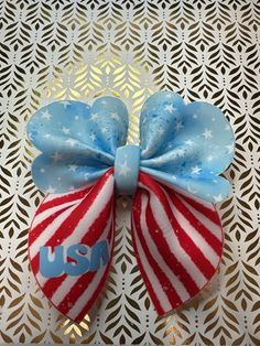 The hairbow is inspired by independence Day. Barrette Clip, Barrettes, Independence Day, Bubbles, Hair Accessories, Pet Supplies