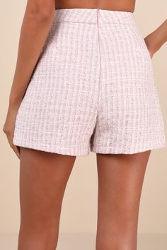 The Glamorous Adept Sophistication Light Pink Tweed Lurex High-Waisted Shorts will let everyone know that you're a stylish dignified diva! These too-cute shorts are composed of textured tweed fabric, with subtle Lurex threading throughout, that shapes a high-rise design with a banded waist. The slim-fitting silhouette features functional sailor-style patch pockets at the front, adorned with faux pearl trim and rhinestone-embellished, faux pearl-inspired buttons. Hidden back zipper/clasp. Pair with the matching blazer for a complete look! Fit: This garment fits true to size. Length: Above mid-thigh. Size medium Inseam: 3.00 Front Rise: 12.50 Waist: Fitted - very fitted at natural waist. Hip: Loosely Fitted. Fabric: Fabric has no stretch. Lined. 95% Polyester, 5% Cotton. Wash Separately Or W Sailor Style, Tweed Shorts, Pink Tweed, Sailor Fashion, Tweed Fabric, Cute Shorts, High Waisted Shorts, Faux Pearl, Light Pink