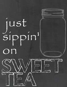 a chalkboard with the words just sippin'on sweet tea and a mason jar