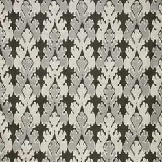 a black and white rug with an intricate design