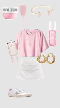 a pink shirt, white skirt, and gold accessories are arranged on a gray background