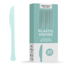 a plastic knife in a box next to it's packaging on a white background