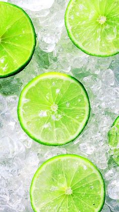 limes are cut in half and placed on ice