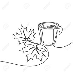 a cup of coffee next to a leaf on a white background stock photo and royalty