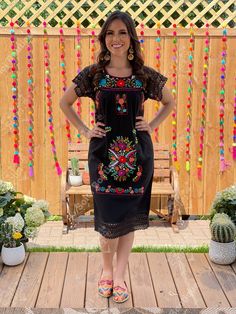 This Beautiful Floral embroidered Dress is the perfect dress to add to your wardrobe. Its cute enough to dress up for a party or everyday wear! It's lightweight, handmade out of Fine Mexican cotton, has beautiful details crocheted throughout and is lined in lace. This dress is handmade and hand embroidered by Mexican Artisans in Puebla, Mexico. Purchase the shoes modeled here: https://www.etsy.com/es/listing/827076671/huarache-megan-artesanal-mexicano-zapato?ref=listings_manager_grid Mexican Fiesta Dresses, Outfit Mexicano, Lace Sleeve Dress, Traditional Mexican Dress, Mexican Embroidered Dress, Fiesta Dress, Dress Traditional, Floral Ruffle Dress, Mexican Dress