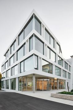 a large white building with lots of windows