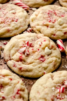 peppermint white chocolate chip cookies with candy canes and crushed sugar on top