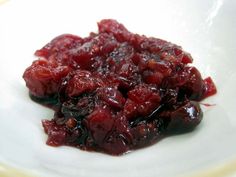 a white plate topped with cranberry sauce