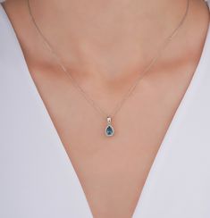 "Blue Topaz Necklace/ Pear Cut London Blue Topaz Necklace with Side Diamonds / 14K White Gold Pendant / Minimalist London Blue Topaz Halo Pendant I especially prefer minimal designs and love to create or produce them. They can fit in our daily life and we easily can integrate and be whole with them. This lovely London Blue Topaz Necklace is to be with you in your every second, to be whole, to become you.  ╰► Specifications ➤ Made to Order.  ➤ Made in Turkey. ➤ 14K White Gold ➤ Custom Gold Color: Rose Gold, Yellow Gold, White Gold ➤ Total CTW: 0.53 Carat ➤ Setting Type: Prong Halo ➤ Natural Earth-Mined & Non-Conflict Diamonds & Gemstone ➤ Ready to Ship in 1 Week ╰► Center Stone Specifications ➤ Gemstone: Natural Topaz ➤ Shape: Pear Cut London Blue Topaz ➤ Weight: 0.45 Carat ➤ Color: London Luxury White Topaz Necklace, Pear-shaped Blue Topaz Gemstone Jewelry, Blue Topaz Pear-shaped Necklace, Blue Pear-shaped Blue Topaz Necklace, London Blue Topaz Necklace, Galaxy Stuff, Blue Topaz Pendant Necklace, Pendant Minimalist, Blue Topaz Necklace