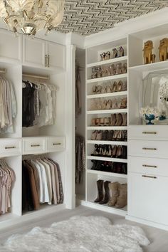 the closet is full of shoes and clothes