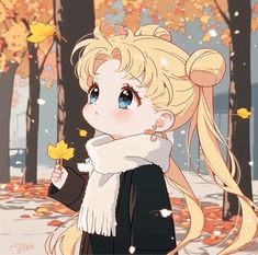 a blonde haired girl with long hair and blue eyes is standing in the woods holding an autumn leaf