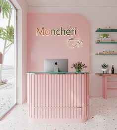 the front desk of a salon with pink walls and shelving behind it, along with shelves that have plants on them