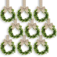 a set of six wreaths with bows