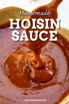 homemade hoisin sauce being poured into a bowl with the words homemade hoisin sauce on it