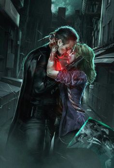 a man and woman kissing in an alleyway with the city lights on behind them