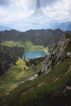 a mountain with a lake in the middle