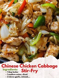 chinese chicken cabbage stir - fry in a black bowl