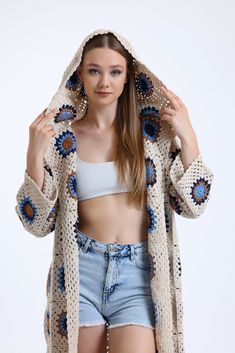 Looking for a unique and stylish way to stay warm this season? Look no further than our Granny Square Patchwork Cardigan! Handcrafted with love and care, this colorful oversized cardigan is made with high-quality cotton and features a stunning patchwork design that will make you stand out from the crowd. Whether you're running errands or lounging at home, this Crochet Cotton Cardigan is the perfect addition to your wardrobe. It's also a perfect Mother's Day gift for your mom, who will appreciate Casual Multicolor Cardigan For The Beach, Bohemian Knit Sweater Coat For Spring, One Size Fall Sweater For Vacation, Beige Winter Cardigan For Vacation, One Size Long Sleeve Sweater For Vacation, Multicolor Knit Outerwear For Summer, Multicolor Cardigan For Vacation, Casual Winter Outerwear For Vacation, Casual Winter Vacation Outerwear