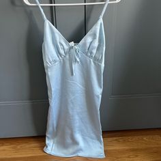 Didn’t Come With Tags, But Brand New And Never Worn. I Bought Two Different Sizes And Now Can’t Return The One That Doesn’t Fit. I’m 5’3 And This Dress Hits The Middle Of My Knees. I Got It For $45 But Selling For $30 :) Please Message Me If Interested, I’m Open To Lowering The Price. Blue Slip Dress, Light Blue Tie, I Got It, Blue Tie, Blue Ties, Got It, Then And Now, The Middle, And Now