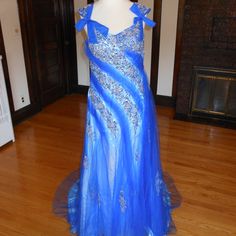 This Is An Elegant Beaded Pageant Evening Dress. It Has An Elegant Pageant Shape And A Chapel Train. The Entire Dress Is Embellished With Exquisite Embroidery And Sparkling Beads/Sequences. It Comes With A Matching Shawl. This Dress Is Brand New In Great Condition. Size: 10 Bust: 38" Waist: 32" Hips: 42" Color: Royal Blue Blue Rhinestone Pageant Dress, Blue Evening Dress With Rhinestones For Prom, Blue Rhinestone Evening Dress For Prom, Elegant Blue Evening Dress For Pageant, Blue Embellished Dress For Pageant, Blue Beaded Evening Dress For Prom, Blue Formal Dress With Rhinestones, Blue Rhinestone Evening Dress For Formal Events, Blue Rhinestone Evening Dress For Formal Occasions