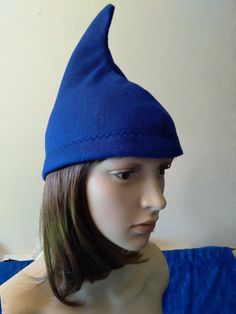 a mannequin head wearing a blue hat