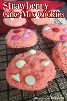 strawberry cake mix cookies cooling on a rack with the words, strawberry cake mix cookies