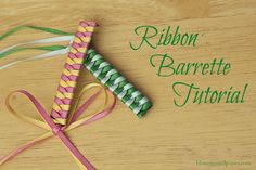 the ribbon is attached to the colorful toothbrush on the wooden surface with text reading ribbon barrete tutor