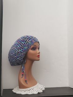 Add some unique style to your wardrobe with this handmade Dragonfly Crochet Dreadlock Tam with drawstring Slouchy Hat. Perfect for any season, this beanie is made with acrylic material and features a beautiful  pattern in monet color. The hat is designed with a reggae character and boho theme, making it perfect for casual occasions and outdoor activities. This stretchy hat comes in size L and is suitable for both men and women. The tam is carefully handmade in the United States, ensuring quality and uniqueness. The hat features a crochet fabric type and has a drawstring slouchy design for comfortable wear. Add this Hippie, Love, and Christmas-inspired hat to your collection today and enjoy a one-of-a-kind fashion statement. Casual Beach Bonnet One Size, Casual One-size Beach Bonnet, Adjustable Acrylic Beanie Cap, Trendy Adjustable Bonnet, Adjustable Trendy Bonnet One Size, Adjustable Beach Beanie, Adjustable Bohemian Beanie Cap, Bohemian Beanie Headwrap, Handmade Adjustable Bonnet For The Beach