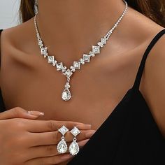 Gender:Women's; What's in the box:1 Necklace,Earrings; Quantity:Two-piece Suit; Theme:Precious,Pear; Style:Sweet,Elegant; Jewelry Type:Bridal Jewelry Sets; Occasion:Wedding,Gift,Daily; Material:Imitation Diamond; Design:Classic; Features:Lovely; Front page:WE; Shipping Weight:0.02; Listing Date:09/03/2024 Wedding Earrings Bride, Pear Jewelry, Pageant Jewelry, Bride Jewelry Set, Wedding Party Accessories, Bride Earrings, Wedding Party Jewelry, Cheap Jewelry, Bride Jewellery