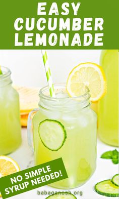 two mason jars filled with lemonade and cucumber slices, one has a green striped straw