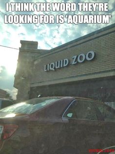 a car parked in front of a store with the words, when you can't remember the word for an aquarium