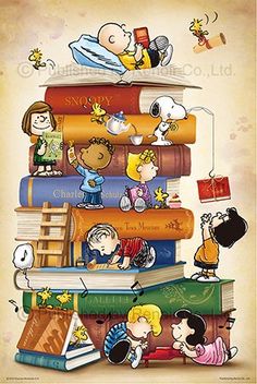 a stack of books with cartoon characters on top of each book and the words charlie brown above them