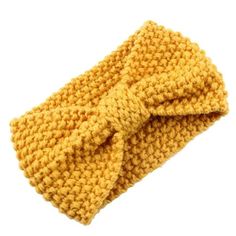 a yellow knitted headband with a bow