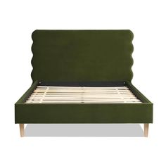 a green bed frame with wooden legs and headboard on top of the bed, against a white background