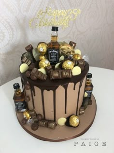 a birthday cake with chocolate and candies on top