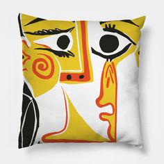 a yellow and black pillow with an abstract painting on the front, featuring two faces