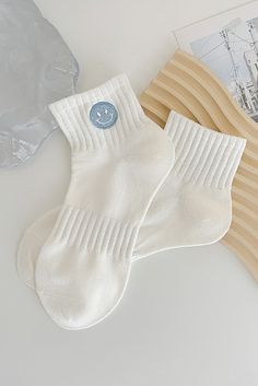 Introducing our Light Blue Cute Smile Face Embroidered Cotton Socks! Made from soft, high-quality cotton, these socks feature a charming smiley face embroidery, adding a touch of cuteness to any outfit. With a light blue color, they are perfect for everyday wear. Stay comfortable and stylish with our delightful socks. Face Embroidery, Cute Smiley Face, Embroidered Socks, Blue Cute, Sock Game, Cute Smile, Cotton Crafts, Face Design, Light Blue Color