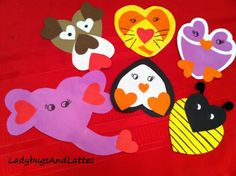 the paper cut out animals have hearts on them