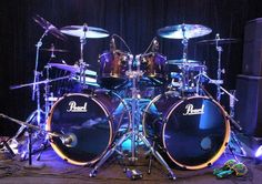 a blue drum set sitting on top of a stage