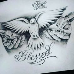 a drawing of two hands holding a bird with the words, blessed written on it