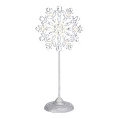 a silver and white snowflake with lights on it's top stands in front of a white background