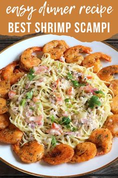 shrimp scamps and pasta on a white plate with text overlay