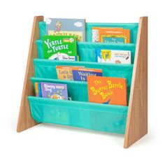 a wooden book stand with blue plastic bins filled with books and children's books